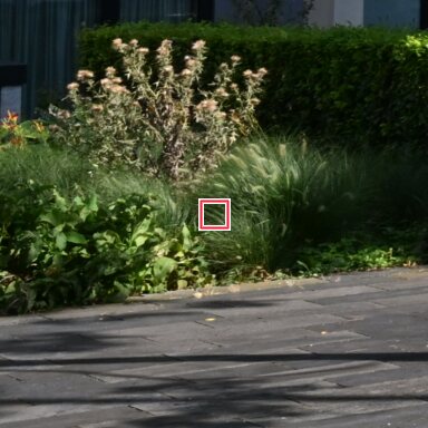 Scene 15 context crop with the evaluated detail region outlined in red